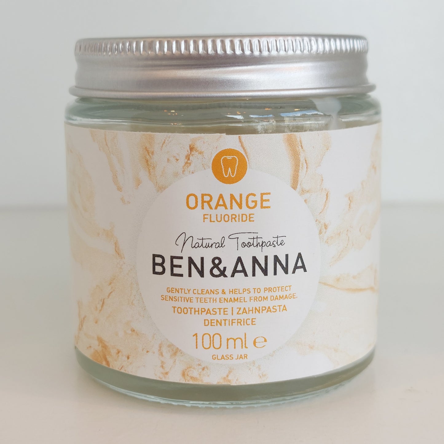 Orange toothpaste with fluoride / 100ml